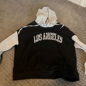 Gray hood, and Gray sleaves black Los Angeles hoodie
